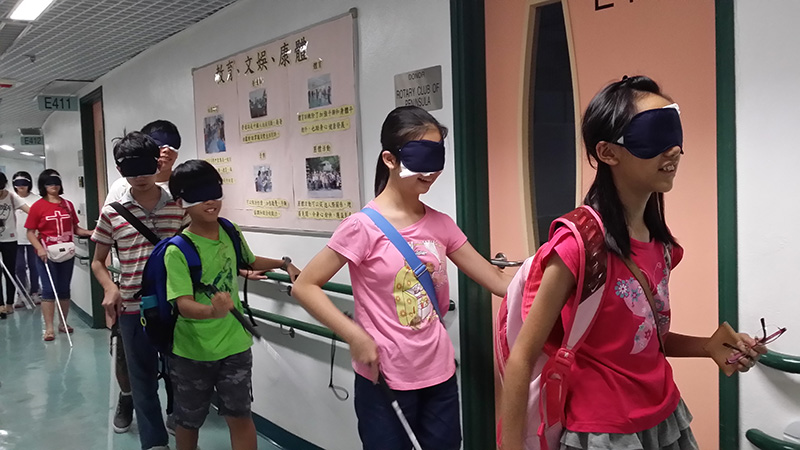 Blind-folded participants trying to walk