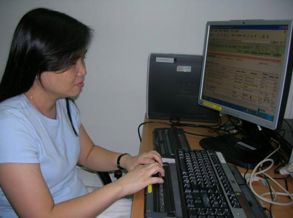 Visually impaired user with the braille eBook web reservation system